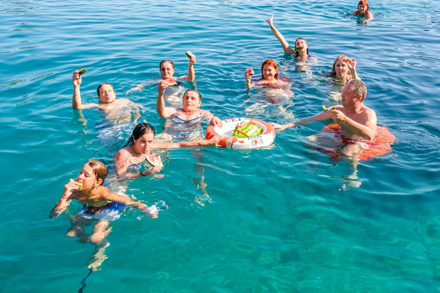 Group swimming with a floatie