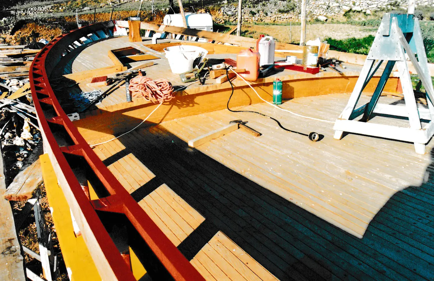 Laying the fresh timber deck plank by plank