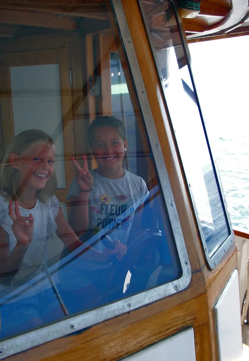 Kids having fun in the boat cabin